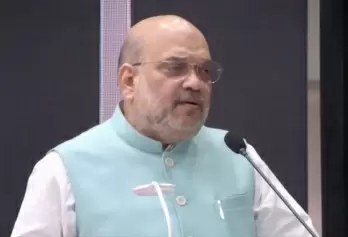India's 100 cr Covid vax is historic & proud moment: Shah